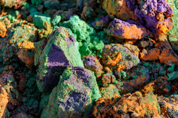 Multi-colored garbage on the ground.