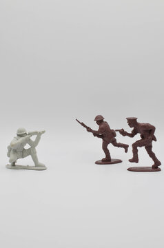 toy soldiers.plastic toys on a white background.Confrontation.