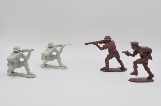 toy soldiers.plastic toys on a white background.Confrontation.