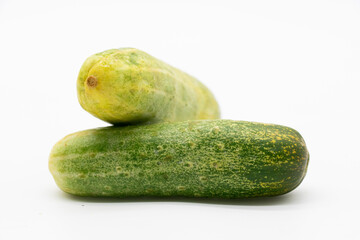fresh green cucumber over on white background.