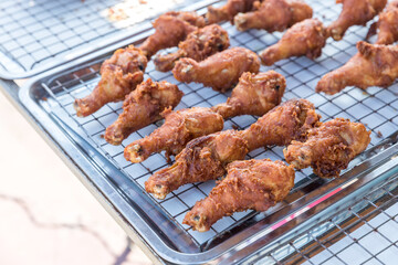 crispy fried chicken on street food market in Thailand. Delicious homemade crispy fried chicken. Crunchy Fried Chicken Ready To Eat