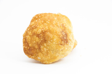 Puffed fried puri isolated on a white background