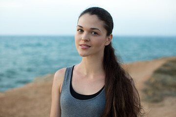 Smiling Female Jogger at Sunset