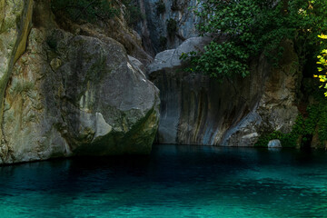 Fototapeta na wymiar rocky canyon with blue water in Goynuk, Turkey