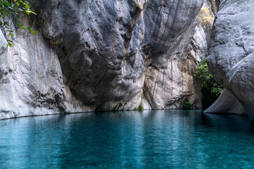 beautiful rocky canyon with blue lake in Goynuk, Turkey