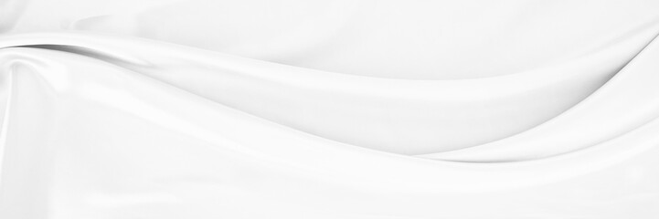 White gray satin texture that is white silver fabric silk background with beautiful soft blur pattern natural.