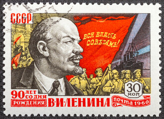 RUSSIA - CIRCA 1960: A stamp printed in USSR, shows portrait of the Lenin and revolution Slogan All Power to the Soviets , series 90th anniversary of Lenin's birth, circa 1960
