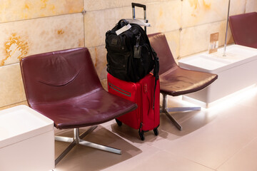 Bag in lounge at airport ready for near travel, high quality photo