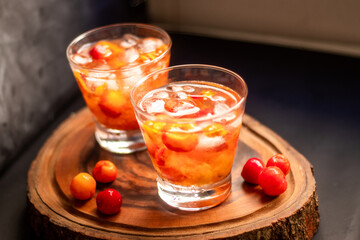 Brazilian Caipirinha, made with Acerola(Barbados Cherry) and cachaça, traditional drink from Brazil.  