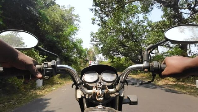 bike ride in malvan green trees south india beautiful road