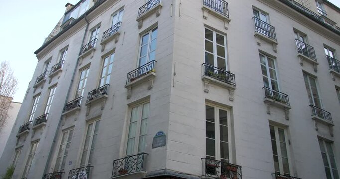 Cinematic view of historic city building, architecture and facade in the french capital Paris, France.
