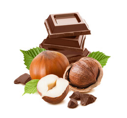 Hazelnuts and stack of chocolate squares isolated on white background.