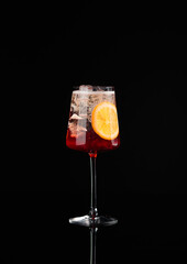 Cocktail in a glass on a black background