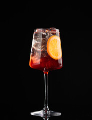 Cocktail in a glass on a black background