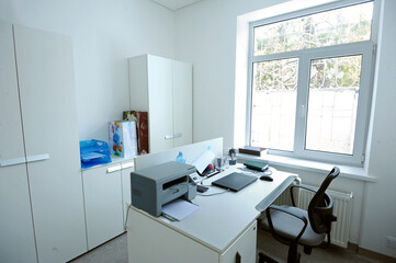 Empty accountant room. Worktable, chairs, office furniture and equipment