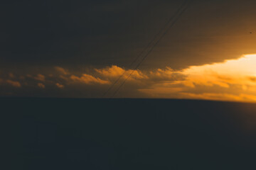 Art landscape with a view of the city and sunset. With film, grain and blur effects