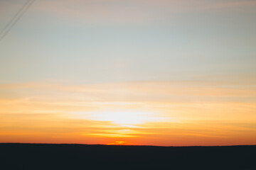 Art landscape with a view of the city and sunset. With film, grain and blur effects