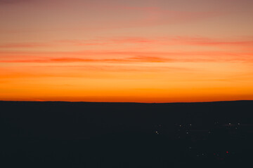 Art landscape with a view of the city and sunset. With film, grain and blur effects