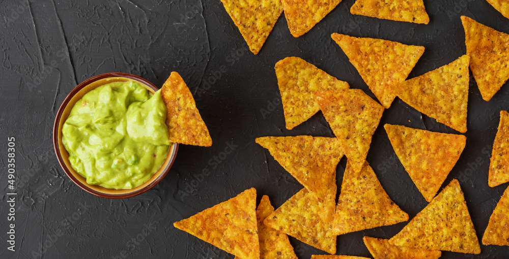 Wall mural bowl with guacamole dip and nachos or tortilla chips