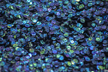 Full background of shiny mermaid colored sequins
