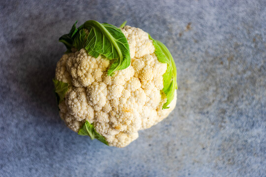 Overhead view of a cauliflower on a table
