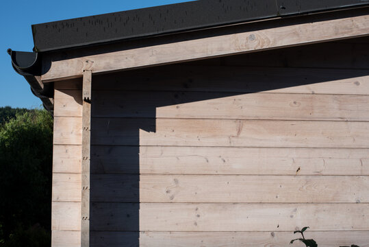 detail of a modern wooden hut in sunlight
