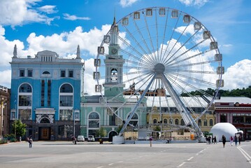 KYIV, UKRAINE, JULY, 2019: Ferris wheel at Kontraktova square in Kyiv, Ukraine