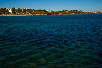 Fototapeta premium DATCA, TURKEY: Beautiful landscape with a view of the sea and the town of Datca on a sunny day.