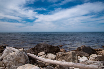 Rocky seashore. Summer seascape. Journey to warmer climes. Natural background.