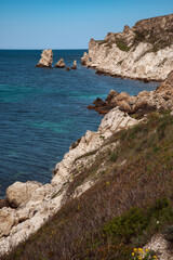 Rocky seashore. Summer seascape. Journey to warmer climes. Natural background.