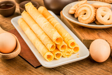 Egg roll biscuit on plate