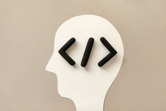 Coding language development icon inside a humans head. Software development concept of innovation or digitization. Programming code browser symbol inside the mind.