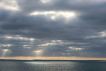 Fototapeta na wymiar A Beautiful UAV Drone Sunset Off the Coast of California on a Cloudy Day with Dramatic Lighting