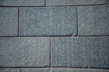 Gray concrete tiles. Stone background. Rectangular figures.