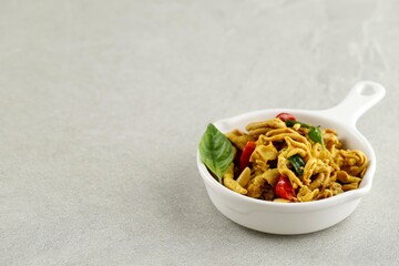 Stir Fry Spicy Chicken Intestine  (Tumis Usus) on White Plate