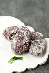 Kue Getas, Indonesian  Traditional Cake made from Black Sticky Rice Flour Coating with Sugar