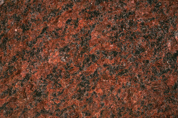 Seamless texture - the surface of natural stone with red spots