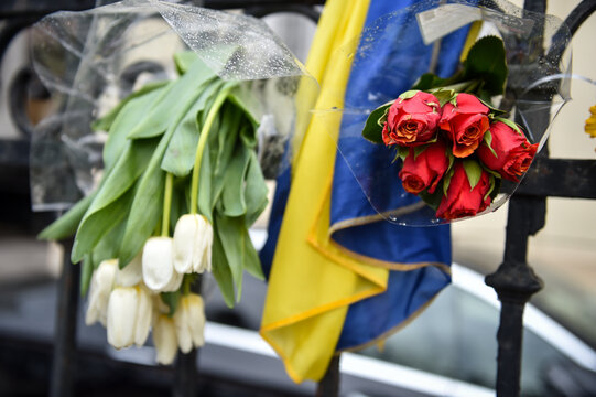 Flowers, candles and banners with different messages are seen on the fence of the Ukraine embassy in Bucharest in the midst of russian invasion of Ukraine.