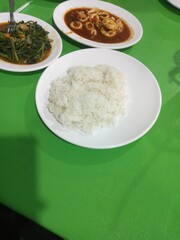 Simple Seafood Dinner Steamed Rice with Stir-fried Greens and Spicy Squid