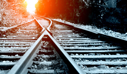 Two railway tracks merge together