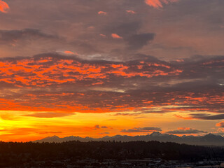 Colorful Sunset Over The Olympic Mountains From Seattle