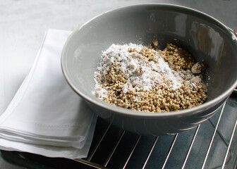 Quinoa in a bowl for baking gluten free bread.