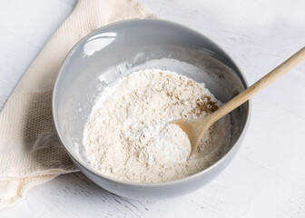 Fototapeta na wymiar Bowl of flour for baking bread