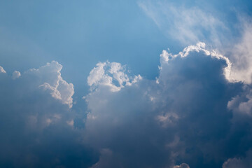 Sun light, sun ray, white clouds, Blue sky for background, wallpaper or backdrop .