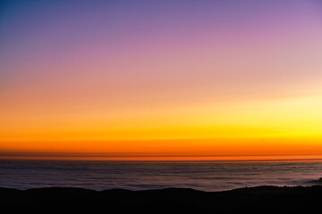 Fototapeta premium sunset over the clouds