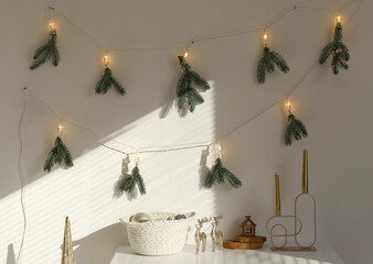 Table with Christmas decor in room