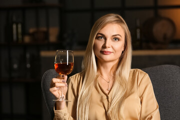 Female sommelier tasting types of wine