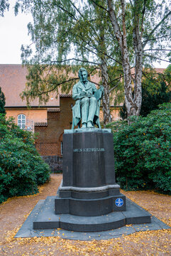 Copenaghen, Denmark - October 3, 2021: View of S&oslash;ren Aabye Kirkegaard Statue in the Royal Library garden
