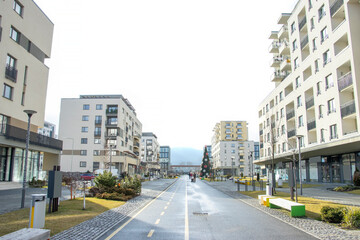 Fototapeta na wymiar street in modern neighbourhood. urban view