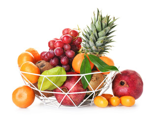 Naklejka na ściany i meble Basket with juicy fruits on white background